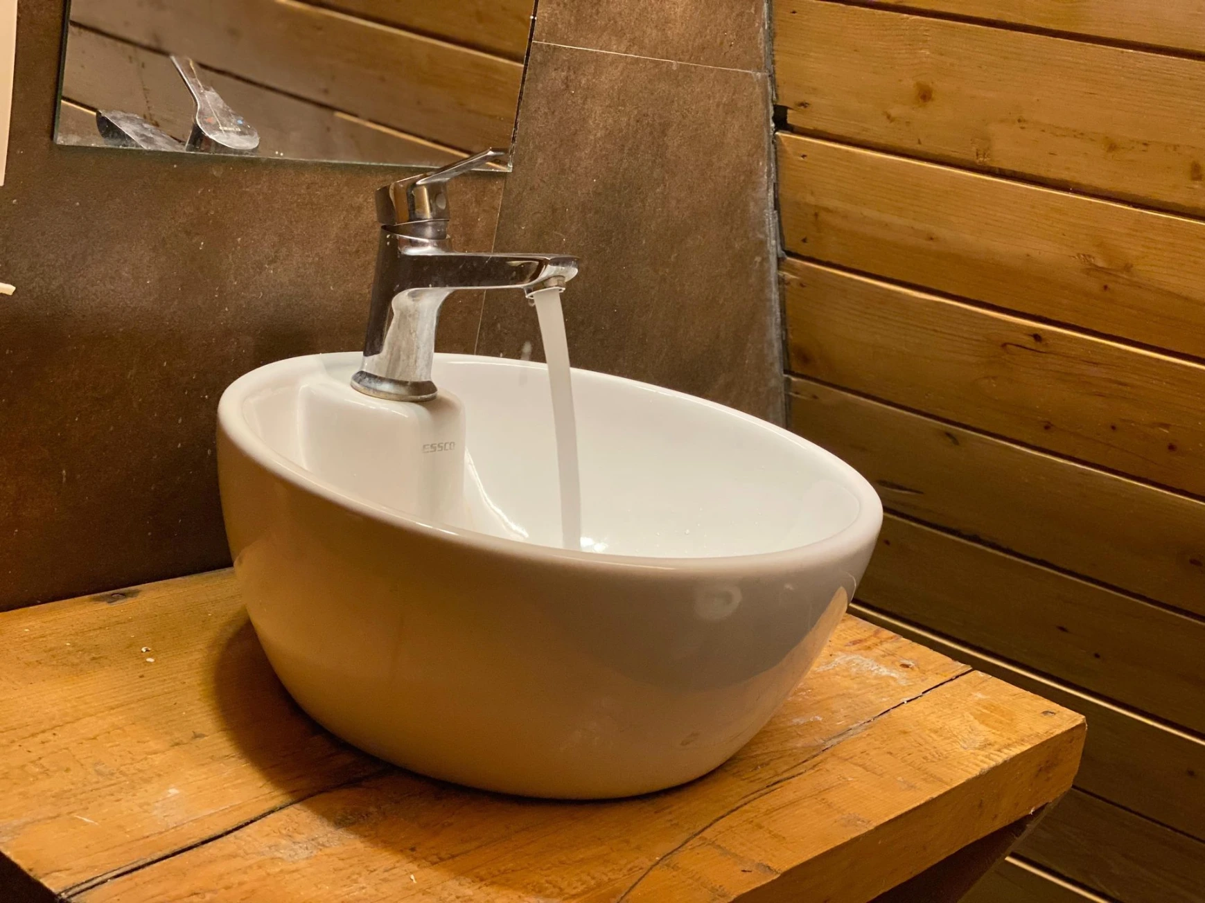 Modern bathroom in luxury A-frame cottage Jibhi