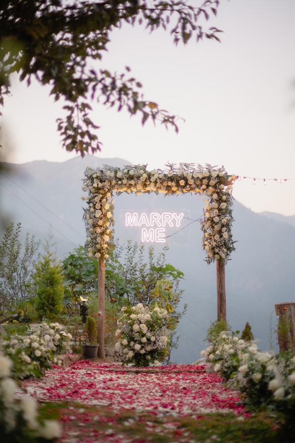 Cozy living space inside two-room cottage in Jibhi