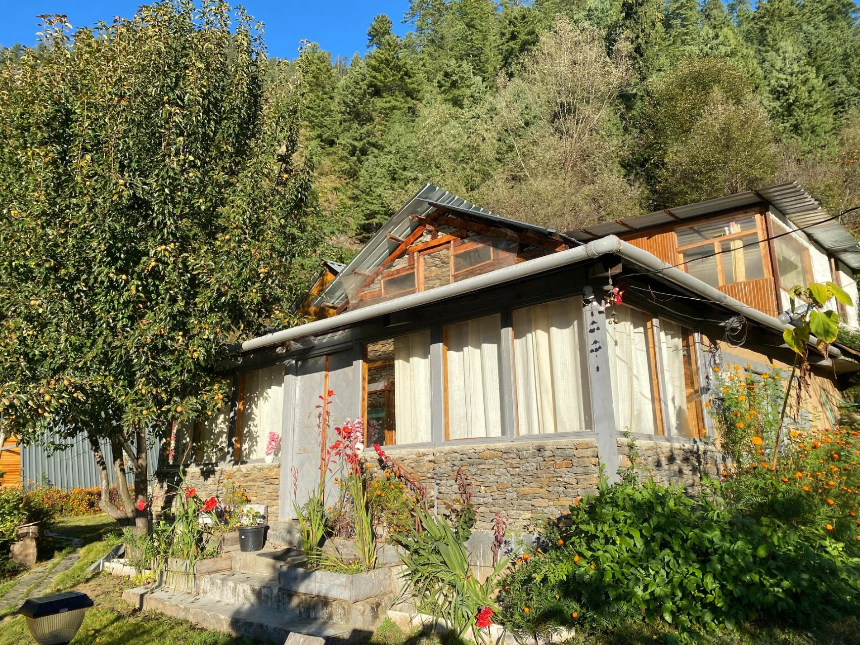Outdoor seating area at Nirvana Tandi Jibhi